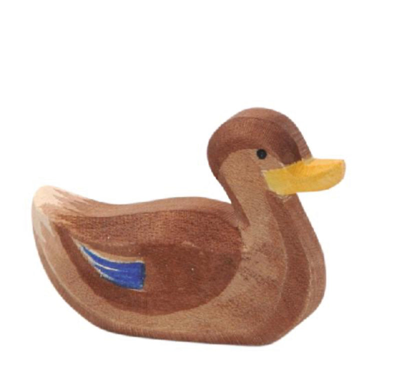 Wooden duck swimming